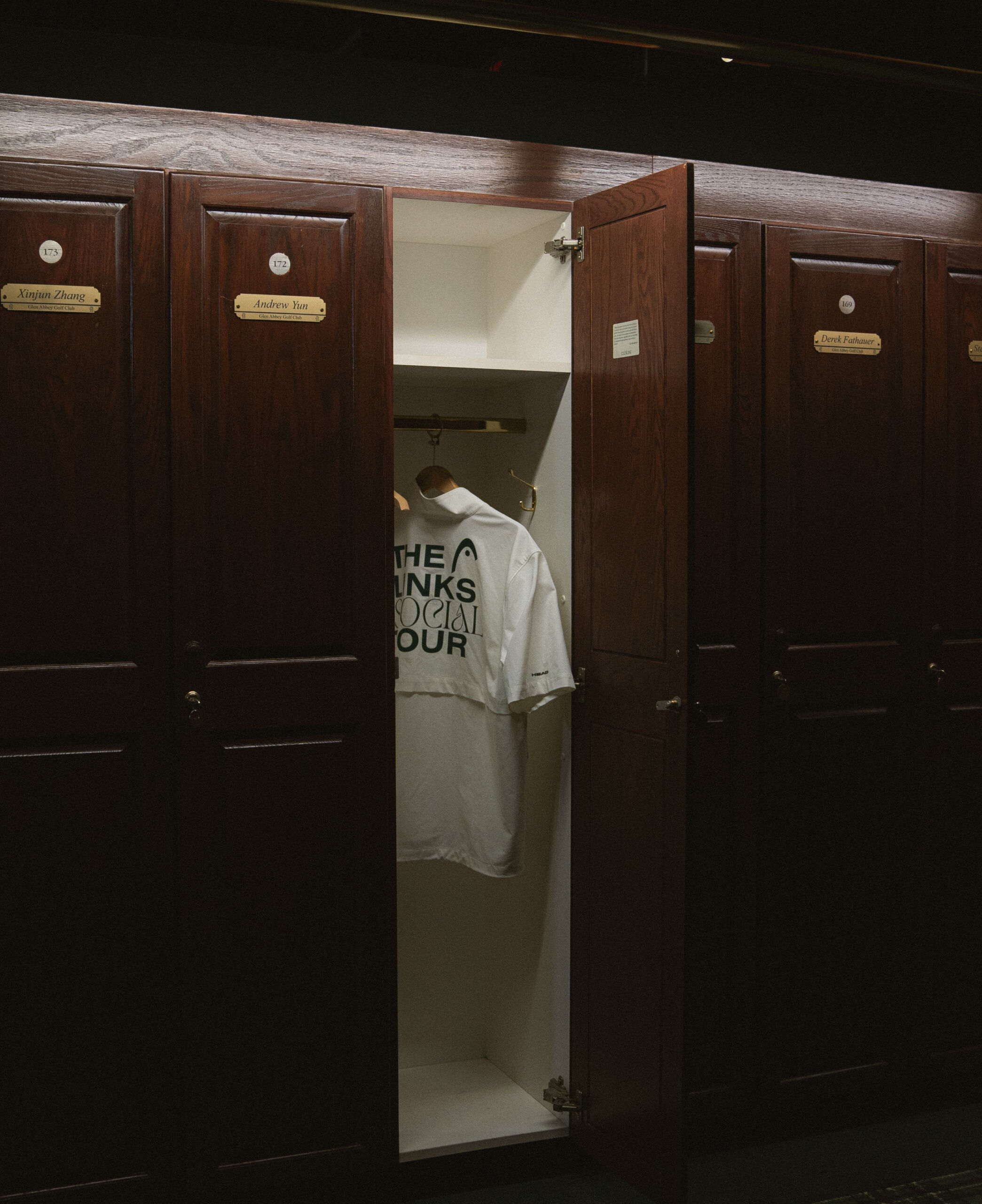 A locker room image that previews The Links Social Tour windbreaker merchandise